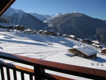 Chalet mit Blick auf die Piste